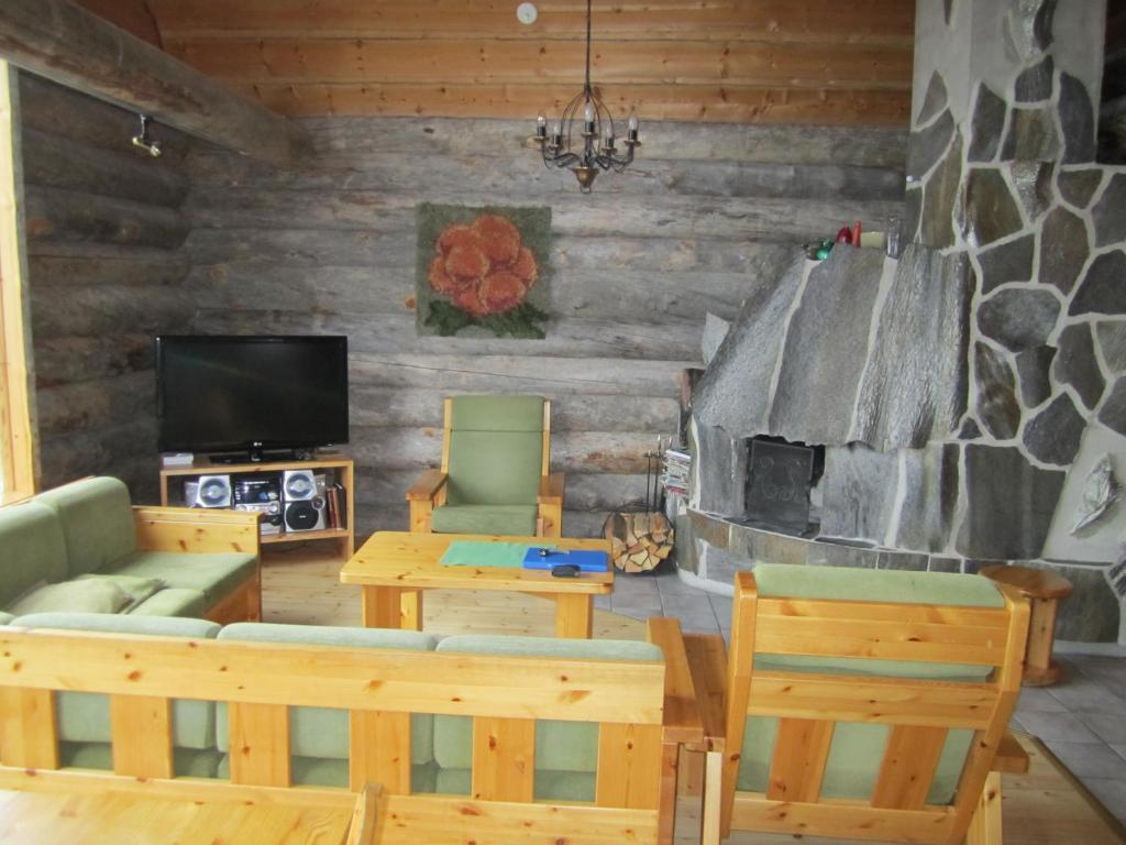 Rukajarven Kelopirtit Cottages Номер фото