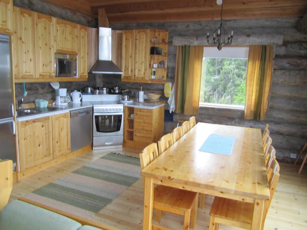 Rukajarven Kelopirtit Cottages Номер фото