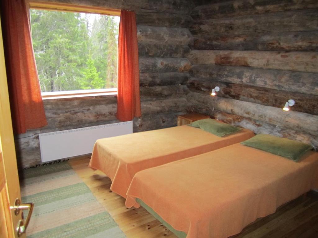 Rukajarven Kelopirtit Cottages Номер фото