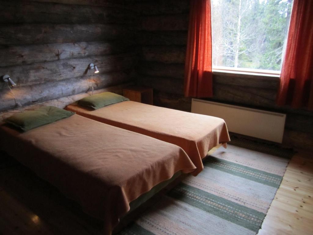 Rukajarven Kelopirtit Cottages Номер фото