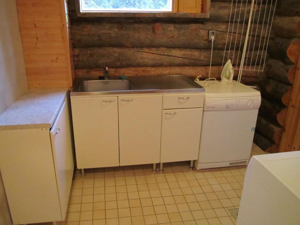 Rukajarven Kelopirtit Cottages Номер фото