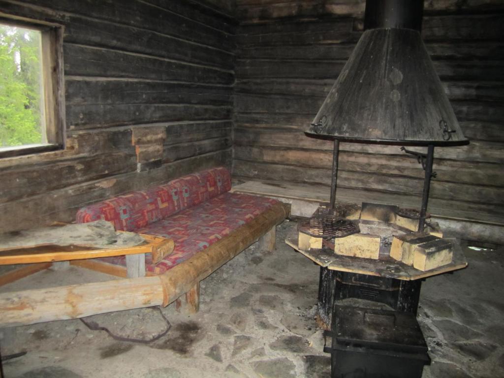 Rukajarven Kelopirtit Cottages Номер фото